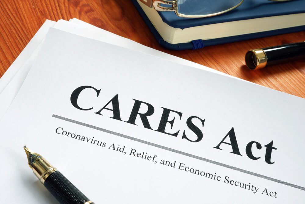 Cares Act form on desk.