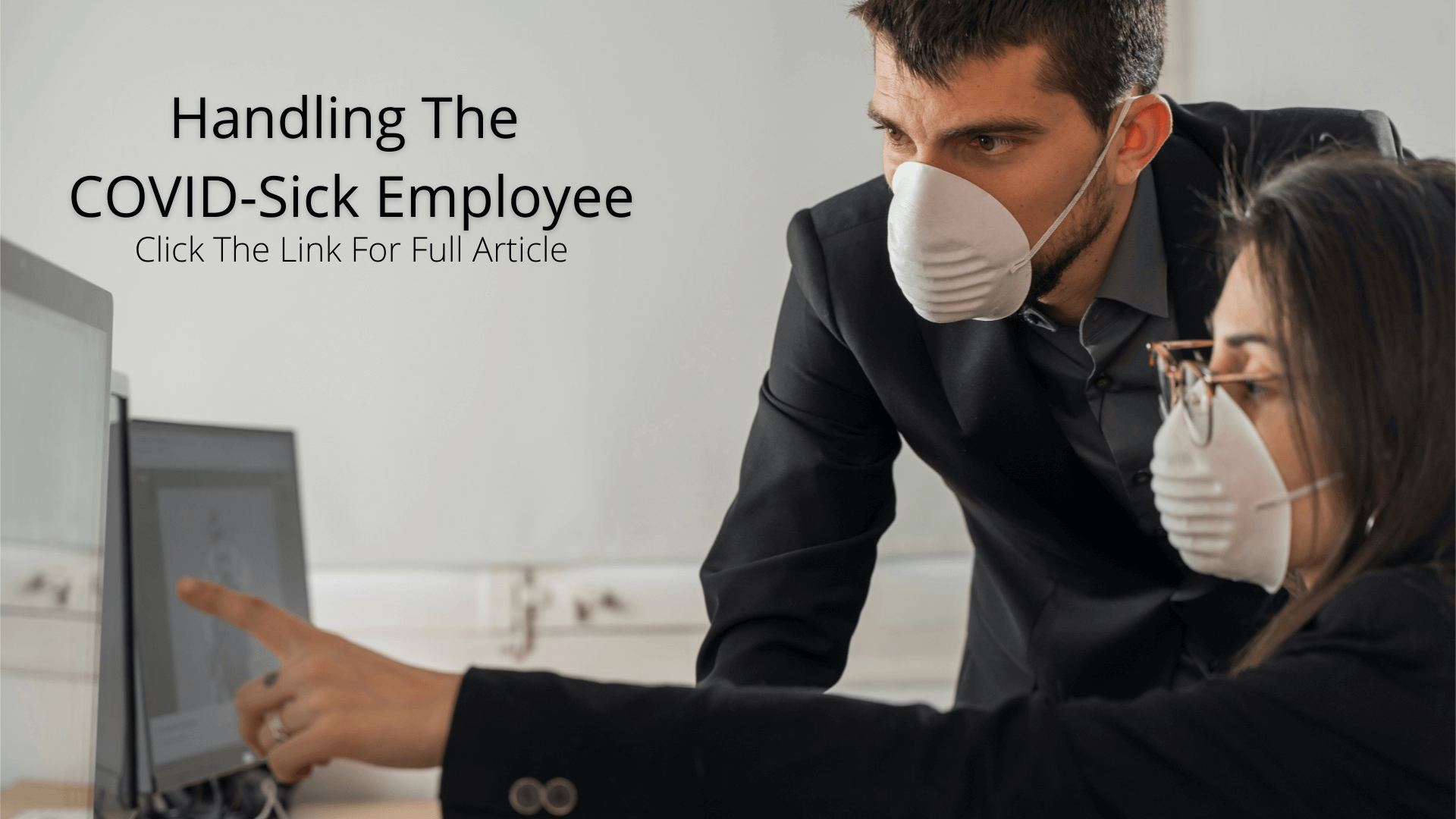 Two employees wearing facemasks