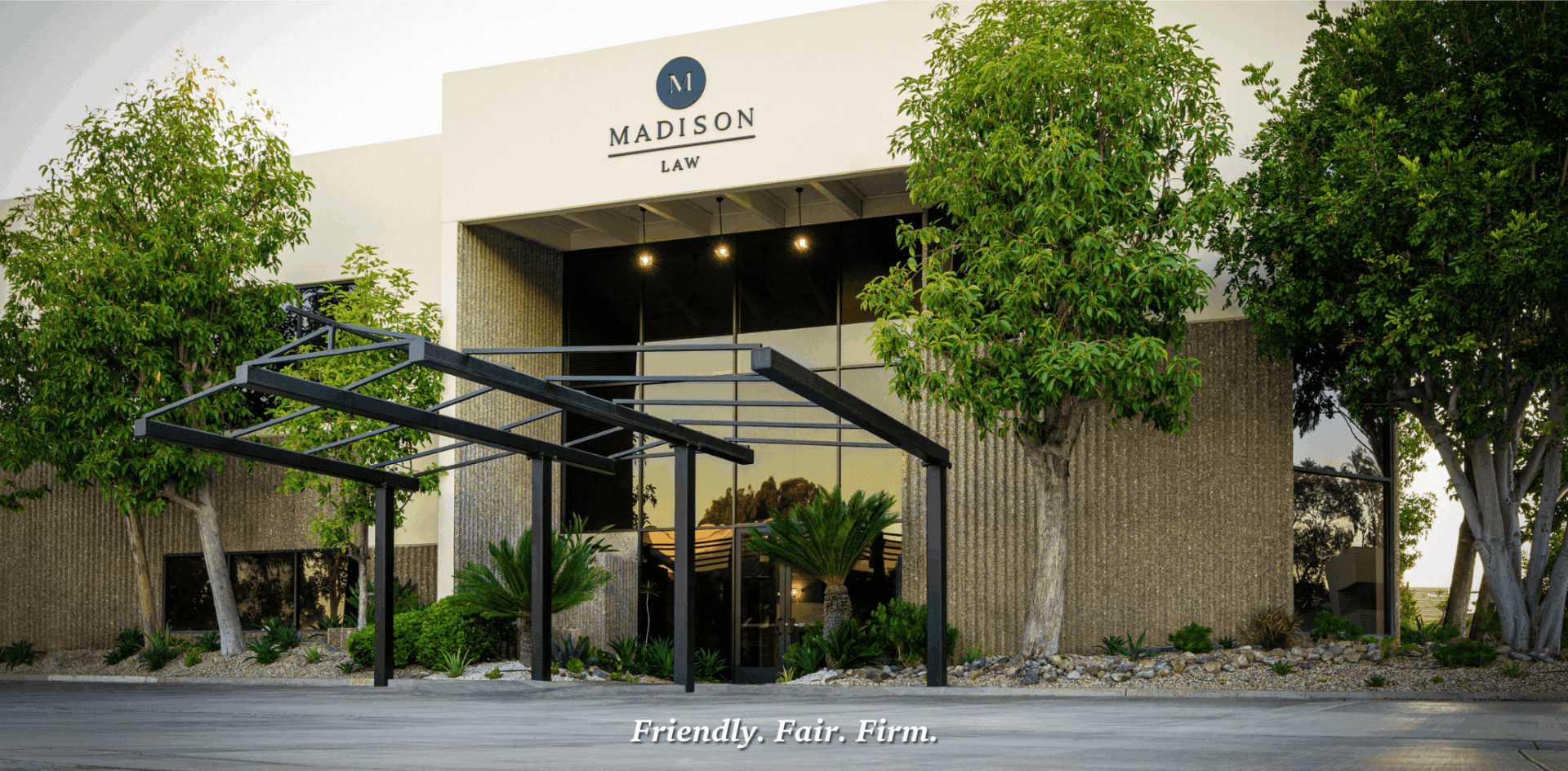 Modern office building with glass entrance facade.